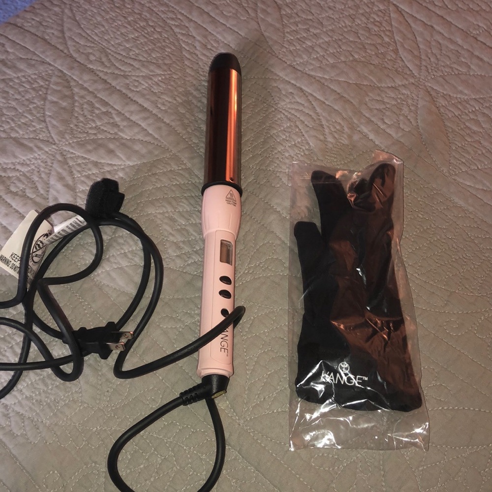 Lange curling wand never used. Size 32 mm.